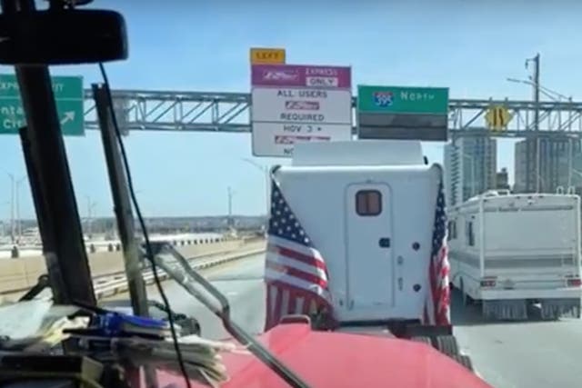 <p>An image from the cabin of one of the drivers participating in the ‘People’s Convoy’ as the trucks sit in traffic on I-395 heading into Washington DC</p>