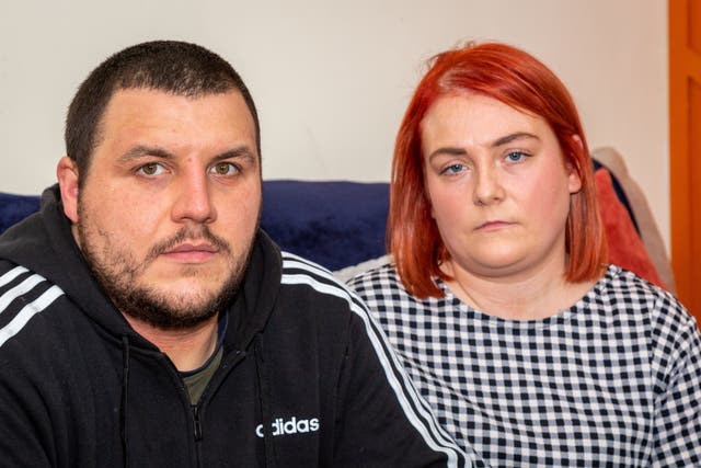 <p>Jade White with her fiance Adam Flitcroft, at their home in Atherton, Greater Manchester</p>