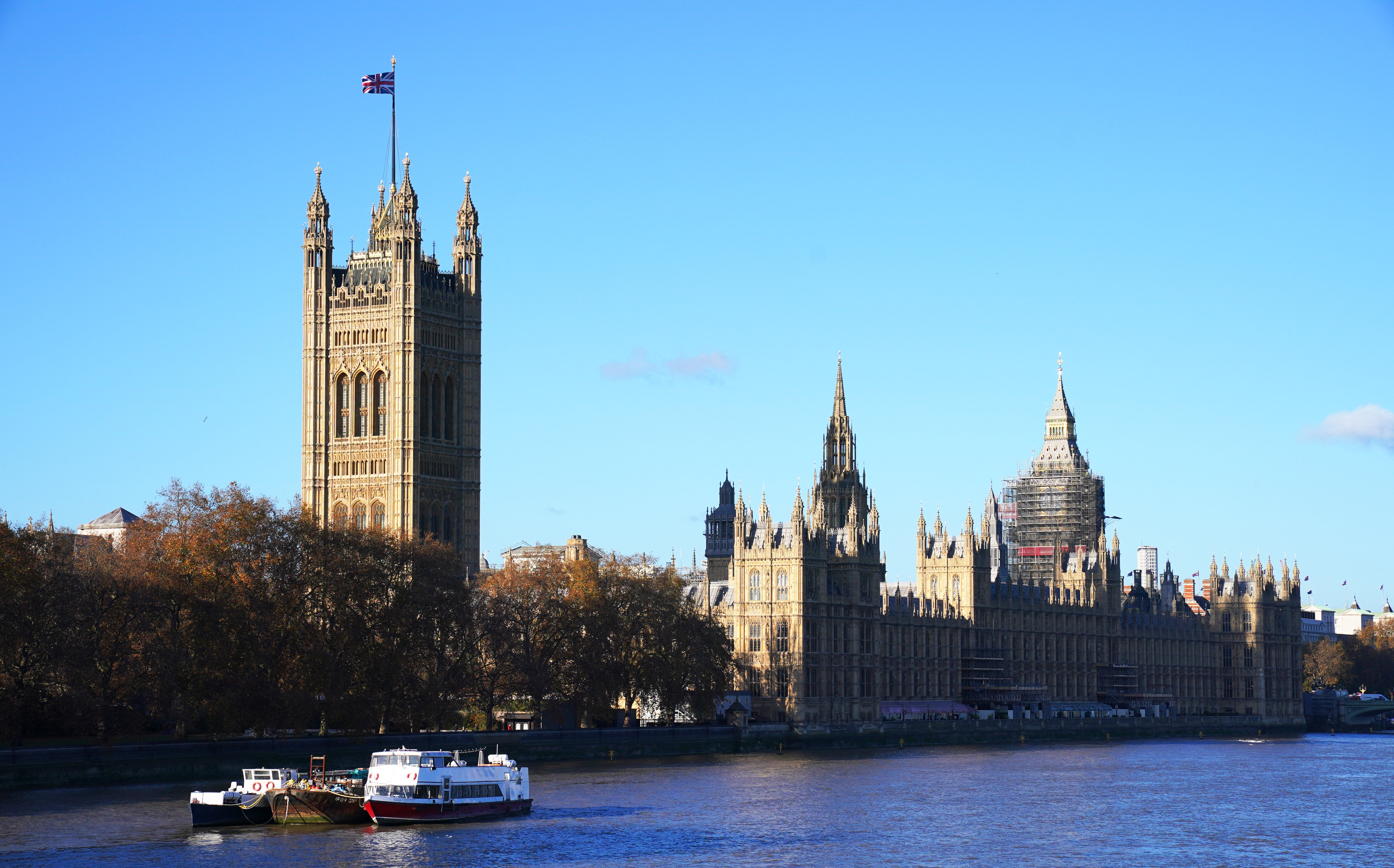 The Union Flag flies above the Victoria Tower and the Palace of Westminster (Jonathan Brady/PA)