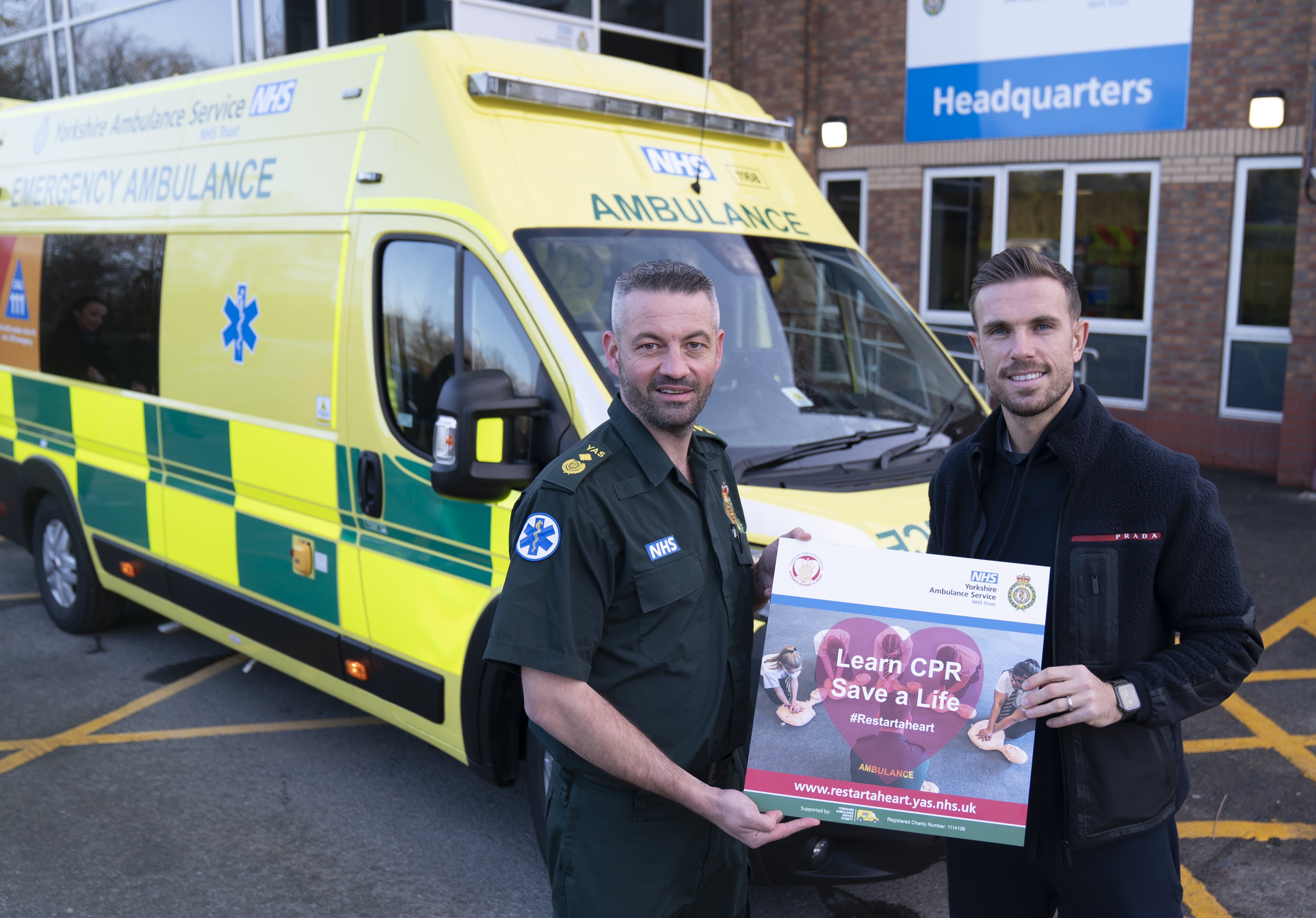 England star and Liverpool captain Jordan Henderson (right) and Andy Pippin, Head of Operations at Yorkshire Ambulance Service (Danny Lawson/PA)