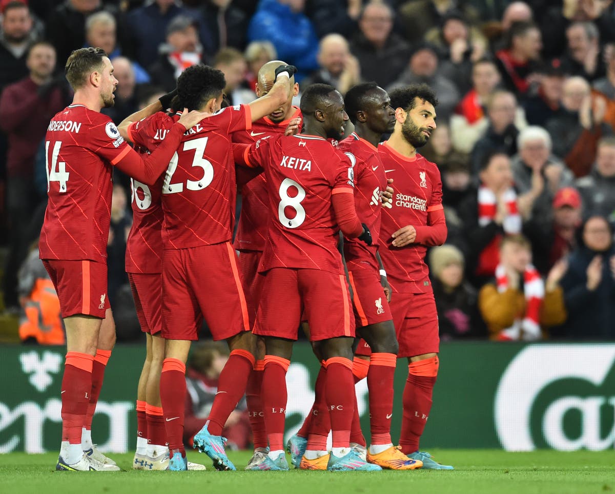 Gary Neville claims Liverpool strikeforce could edge Manchester City to title
