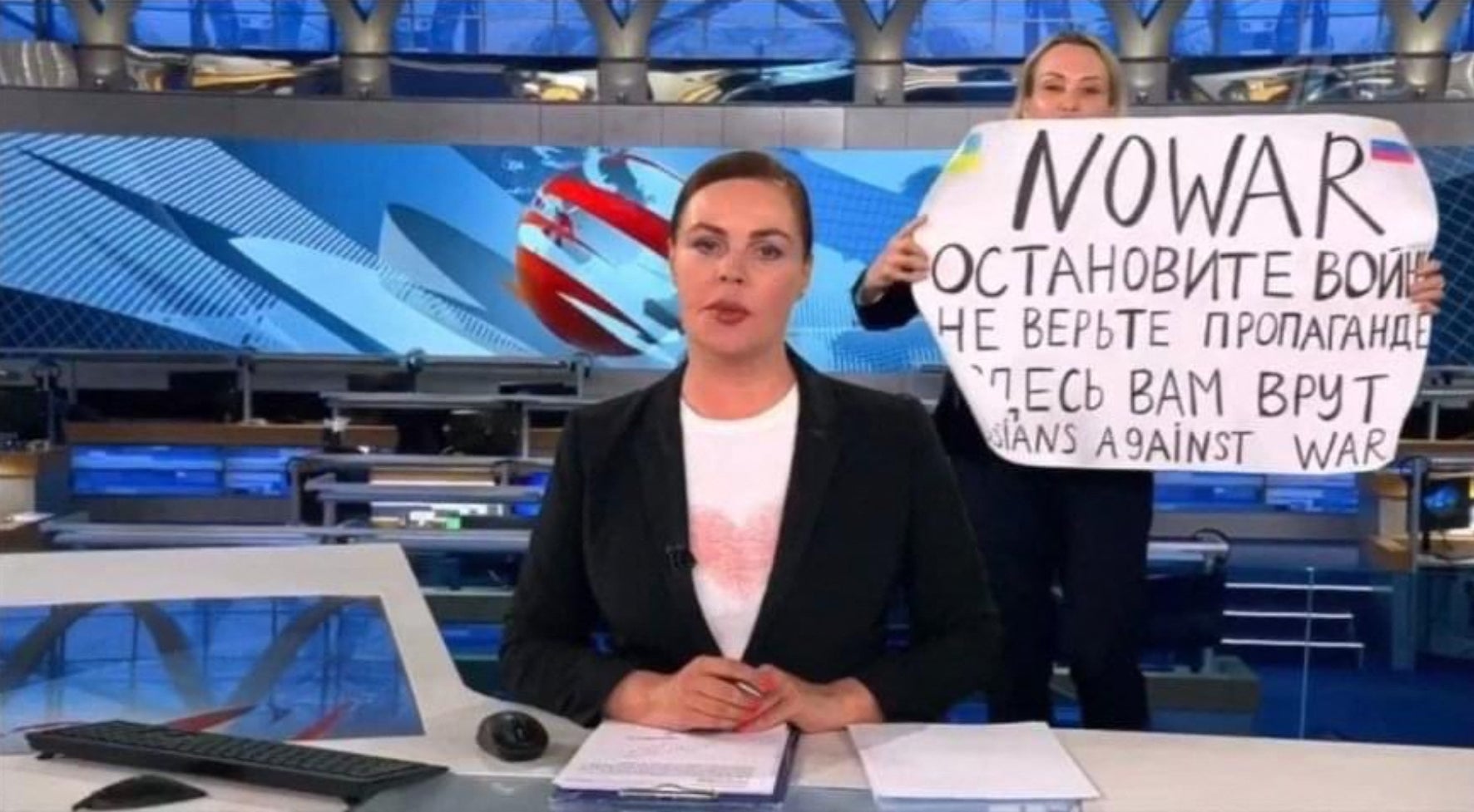Marina Ovsyannikova, a producer on the primetime Russian state TV news show, leapt onto the set with a banner