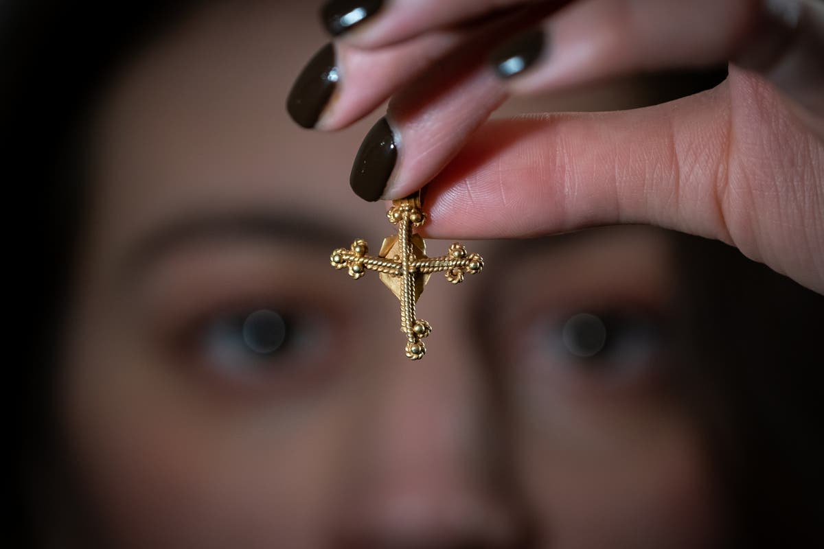 Roofer &lsquo;over the moon&rsquo; after medieval cross sells at auction for &pound;12,400