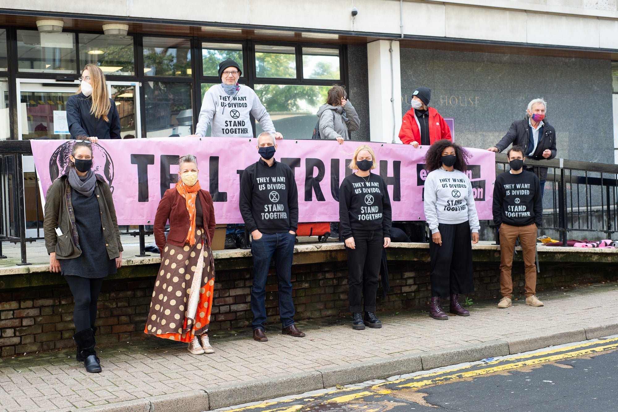 Protesters (bottom, left to right) Charlotte Kirian, Hazel Stenaon, Caspar Hughes, Laura Frandsen, Elise Yard and Amur Jones outside St Albans Magistrates’ Court (Extinction Rebellion/PA)