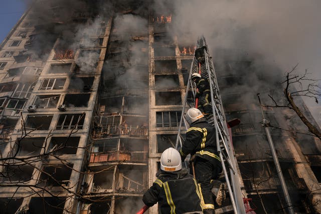 <p>Firefighters battling a blaze in a Kyiv tower block</p>