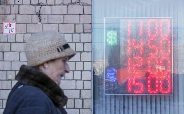 <p>Russia’s rouble has plummeted but the Kremlin wants to use it to pay its dollar-denominated debts</p>