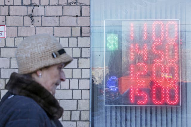 <p>Russia’s rouble has plummeted but the Kremlin wants to use it to pay its dollar-denominated debts</p>