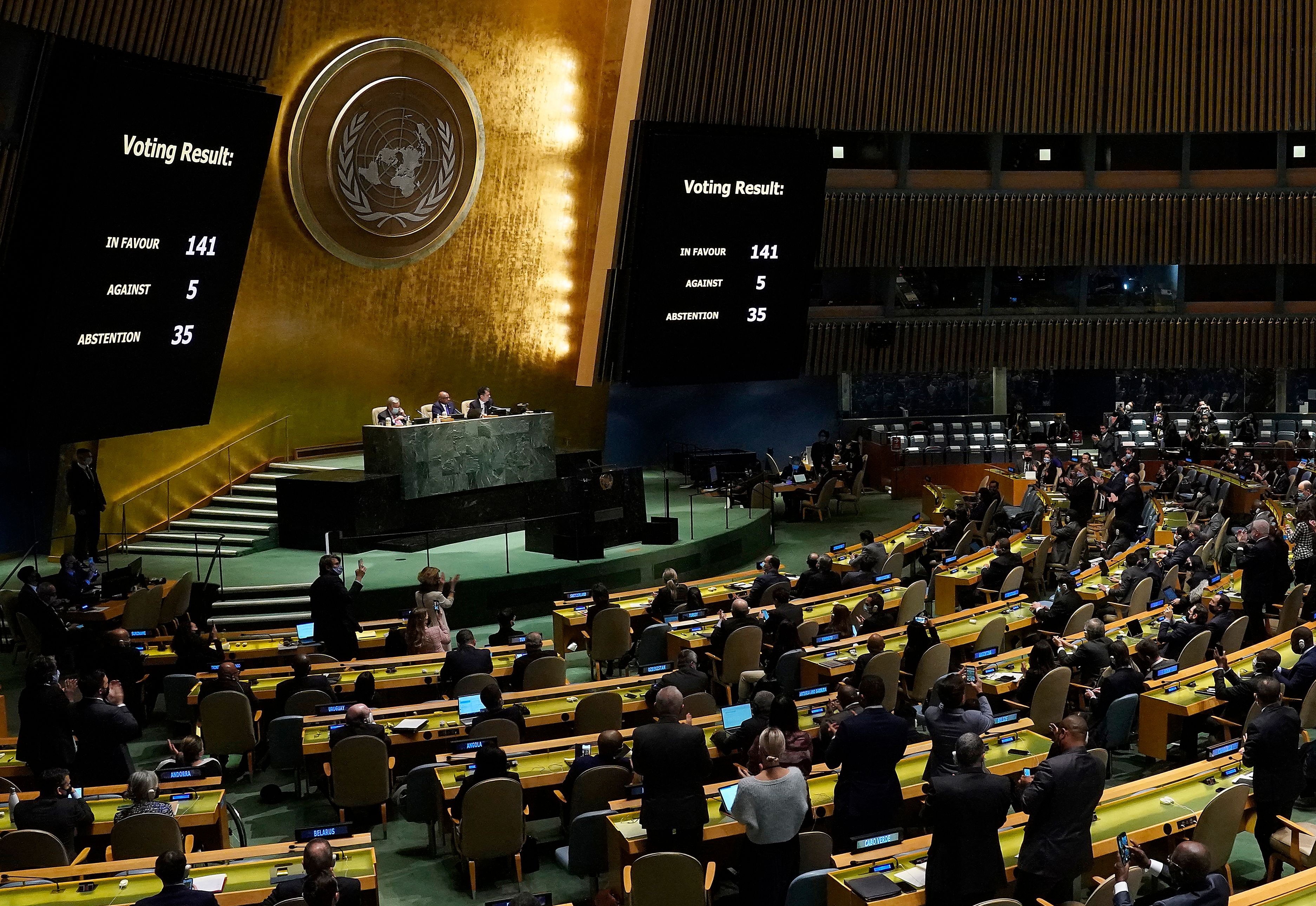 Delegates clap at the UN after a resolution condemning Russian invasion of Ukraine passed