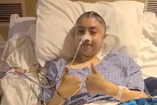 <p>Kemery Ortega, 18, recovering in her hospital bed after she was shot in the head during a drive-by shooting outside her DeMoines, Iowa high school.</p>