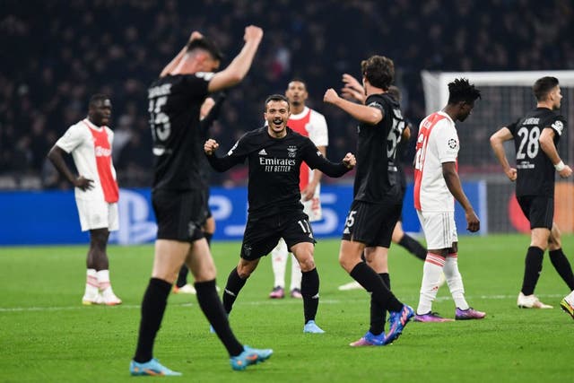 <p>Diogo Goncalves (C) shares the joy as Benfica defeat Ajax </p>