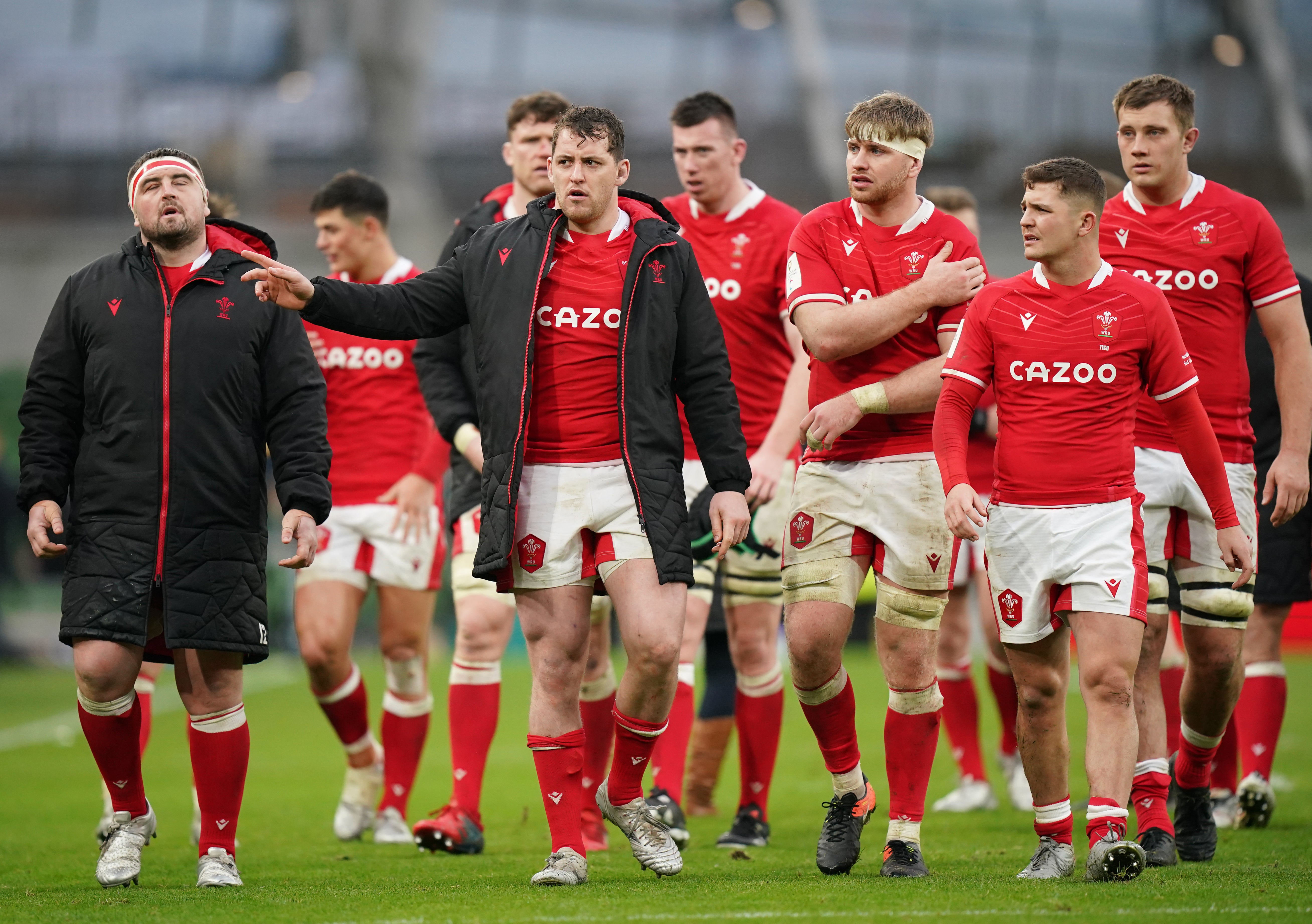 Dejected Wales players after their Six Nations defeat against Ireland (Niall Carson/PA)