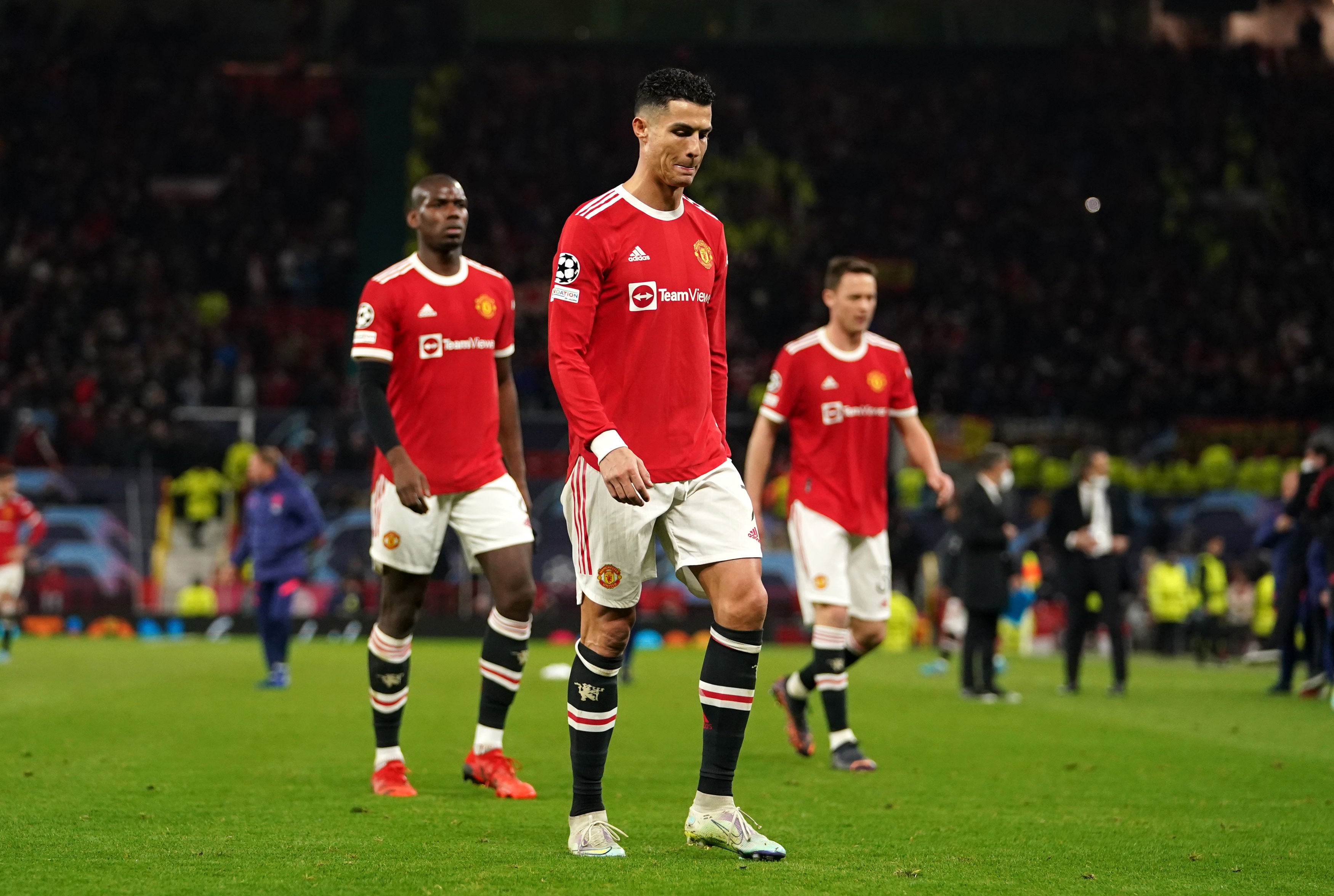 Cristiano Ronaldo departs the field after defeat by Atletico