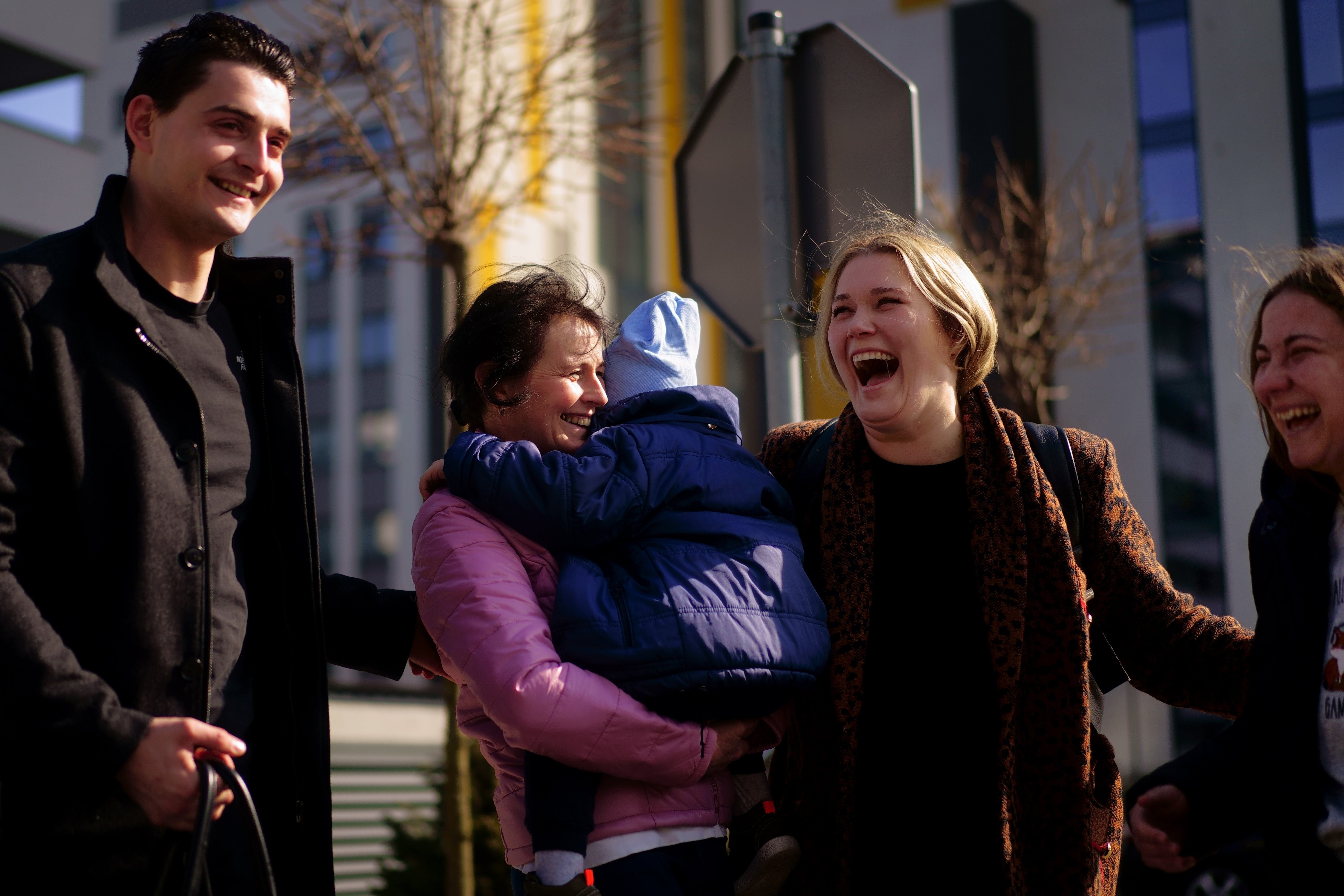 The family were reunited outside a visa office in Rzeszow, Poland