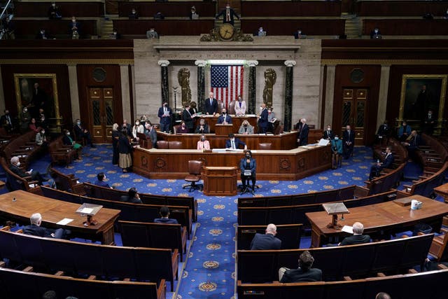 <p>Vice President Mike Pence and Speaker of the House Nancy Pelosi stand after reading the final certification of Electoral College votes cast in November’s presidential election during a joint session of Congress after working through the night, at the Capitol in Washington, U.S.</p>