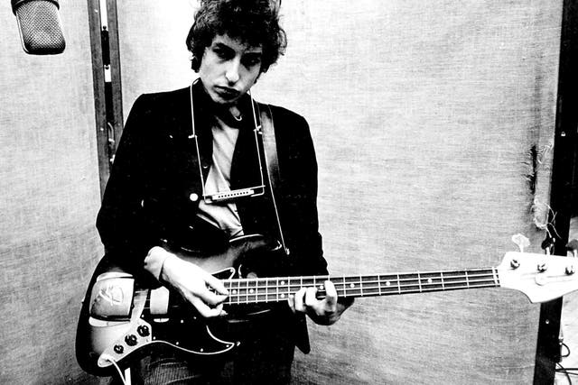 <p>Bob Dylan pictured in 1965 – four years after he released his debut album</p>