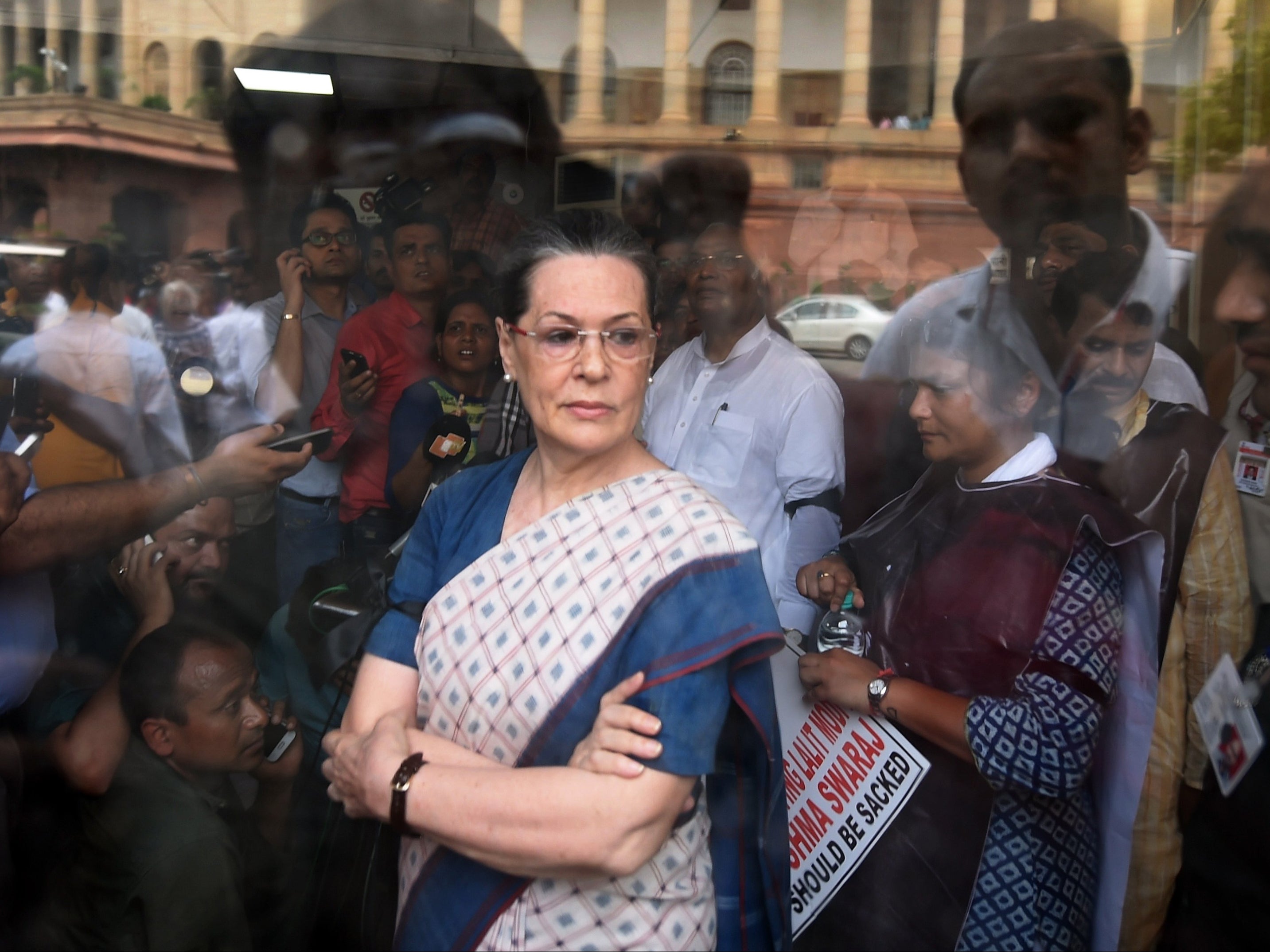 <p>File: Congress President Sonia Gandhi after a protest by Congress Party Members of Parliament at the Mahatma Gandhi statue outside Parliament house in 2015 </p>