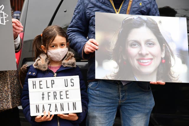 <p>Nazanin Zaghari-Ratcliffe’s daughter Gabriella at a protest outside the Iranian Embassy in London</p>