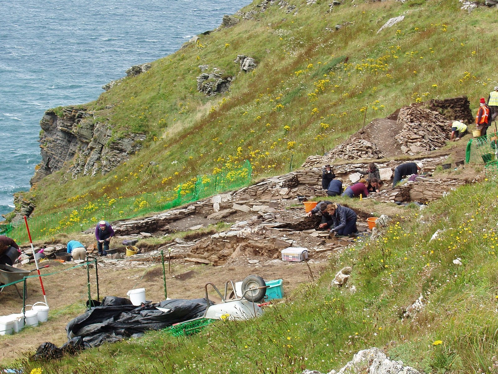 Research suggests that some probable graves near Tintagel, Cornwall, may have been the final resting places of several dark age royals. Separate archaeological work (pictured here) at Tintagel Castle itself has shown over recent years that the area was of great importance in dark age times