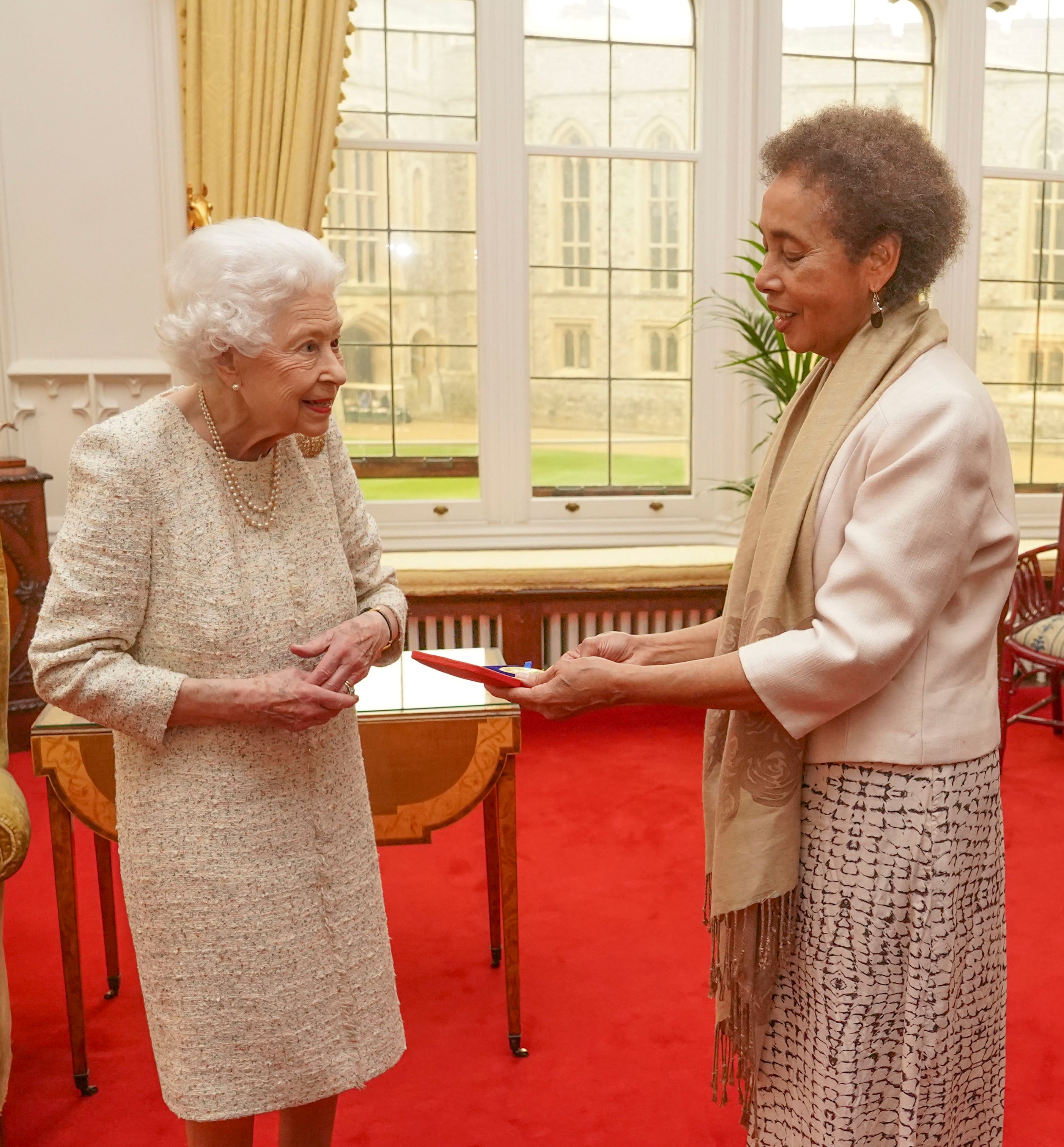The Queen presents the Queen’s Gold Medal for Poetry to Grace Nichols during a private audience at Windsor Castle (Steve Parsons/PA)