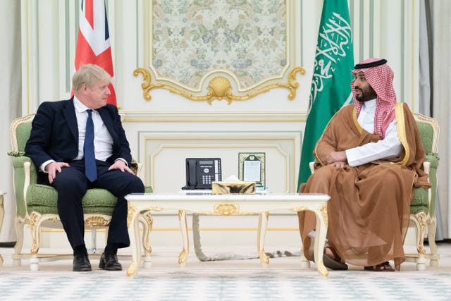 Prime Minister Boris Johnson is welcomed by Mohammed bin Salman (Stefan Rousseau/PA)