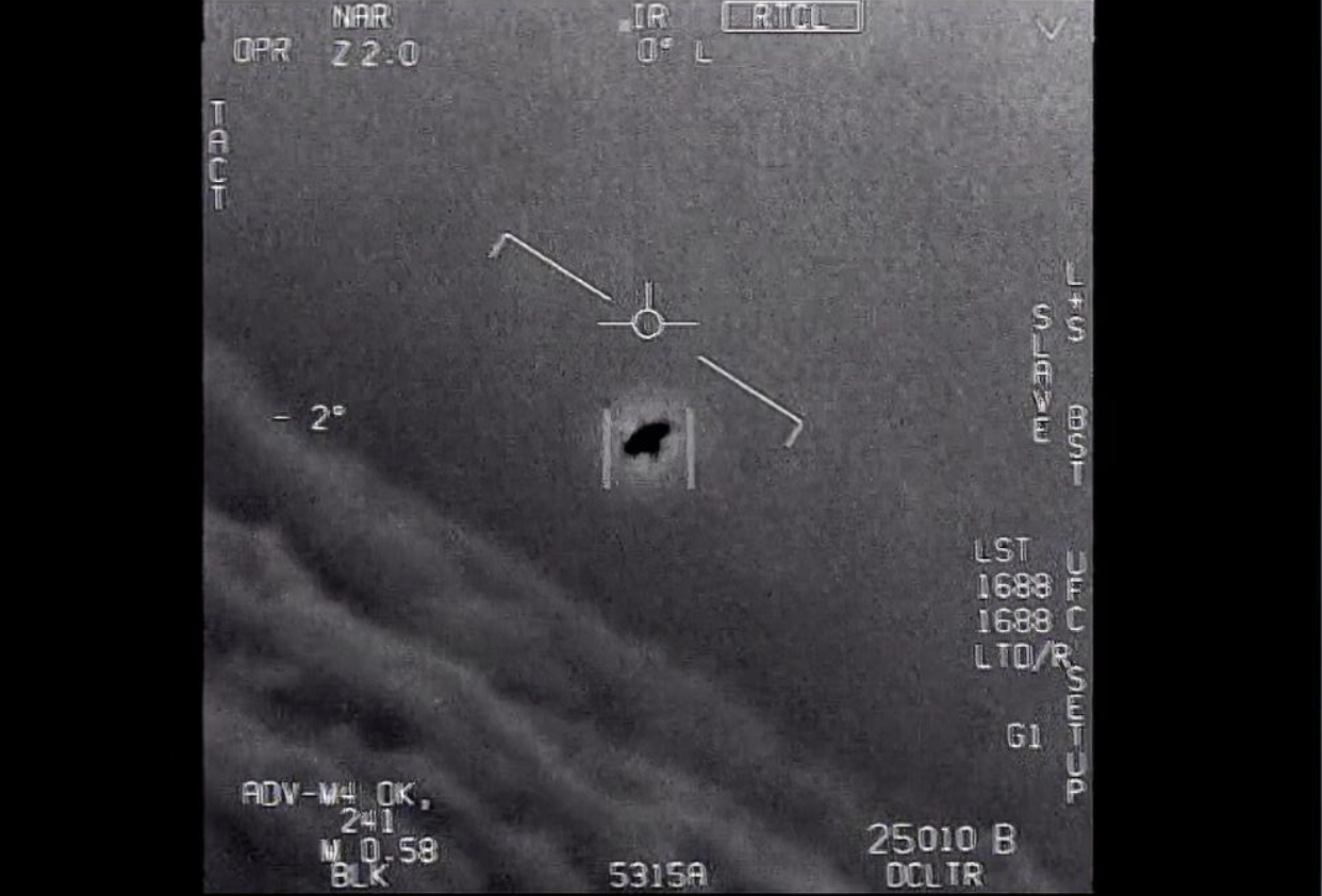 The image released by the Pentagon from 2015 shows an unexplained object is seen at center as it is tracked as it soars high along the clouds