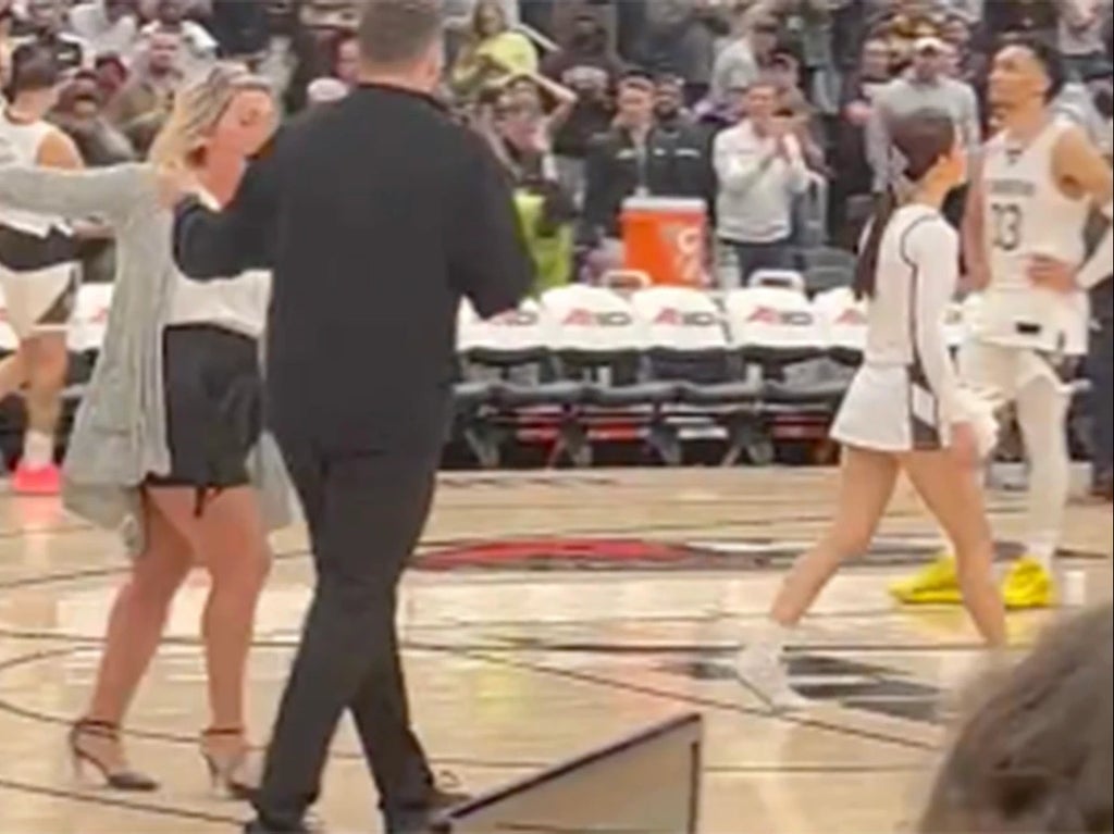 Cheerleader storms off after player hurls abuse at her