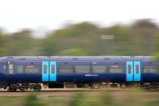 A Southeastern train passing through Ashford in Kent (Gareth Fuller/PA)
