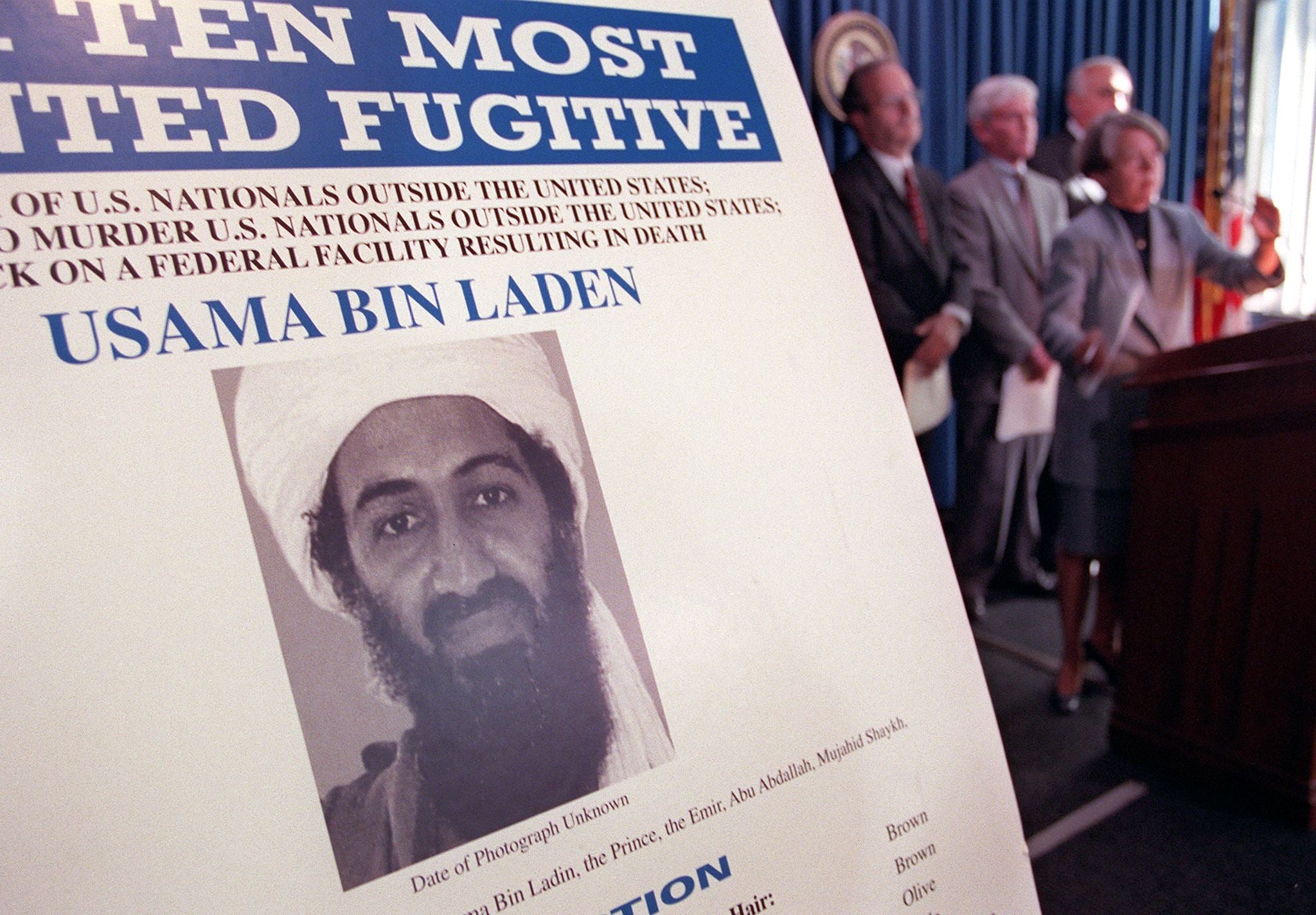 Bin Laden is seen on a poster at a US Justice Department press conference in 1999