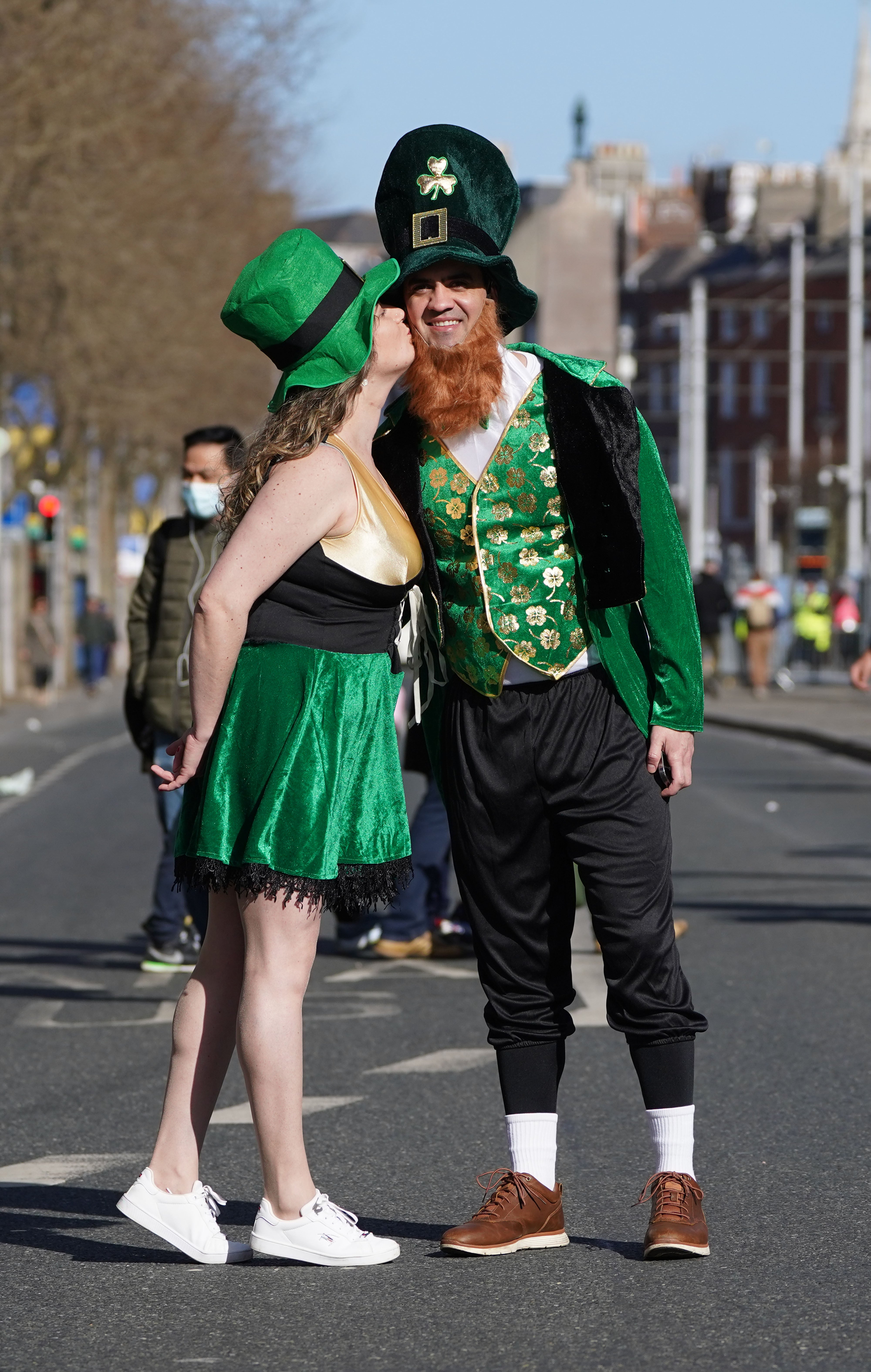 Anna DeAngelis and Bruno Ferranti, from Brazil, dressed up for the St Patrick’s Day Parade in Dublin (Brian Lawless/PA)