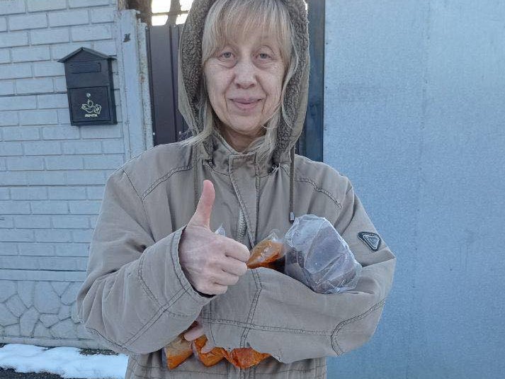 A woman who received aid from Mariia Lohvynenko and her volunteers