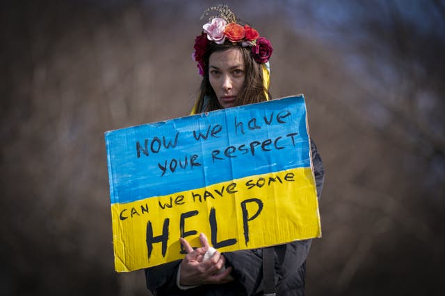 A woman at the Scotland Stands with Ukraine peace rally, outside the Scottish Parliament in Edinburgh, on Thursday March 17 2022 (Jane Barlow/PA)