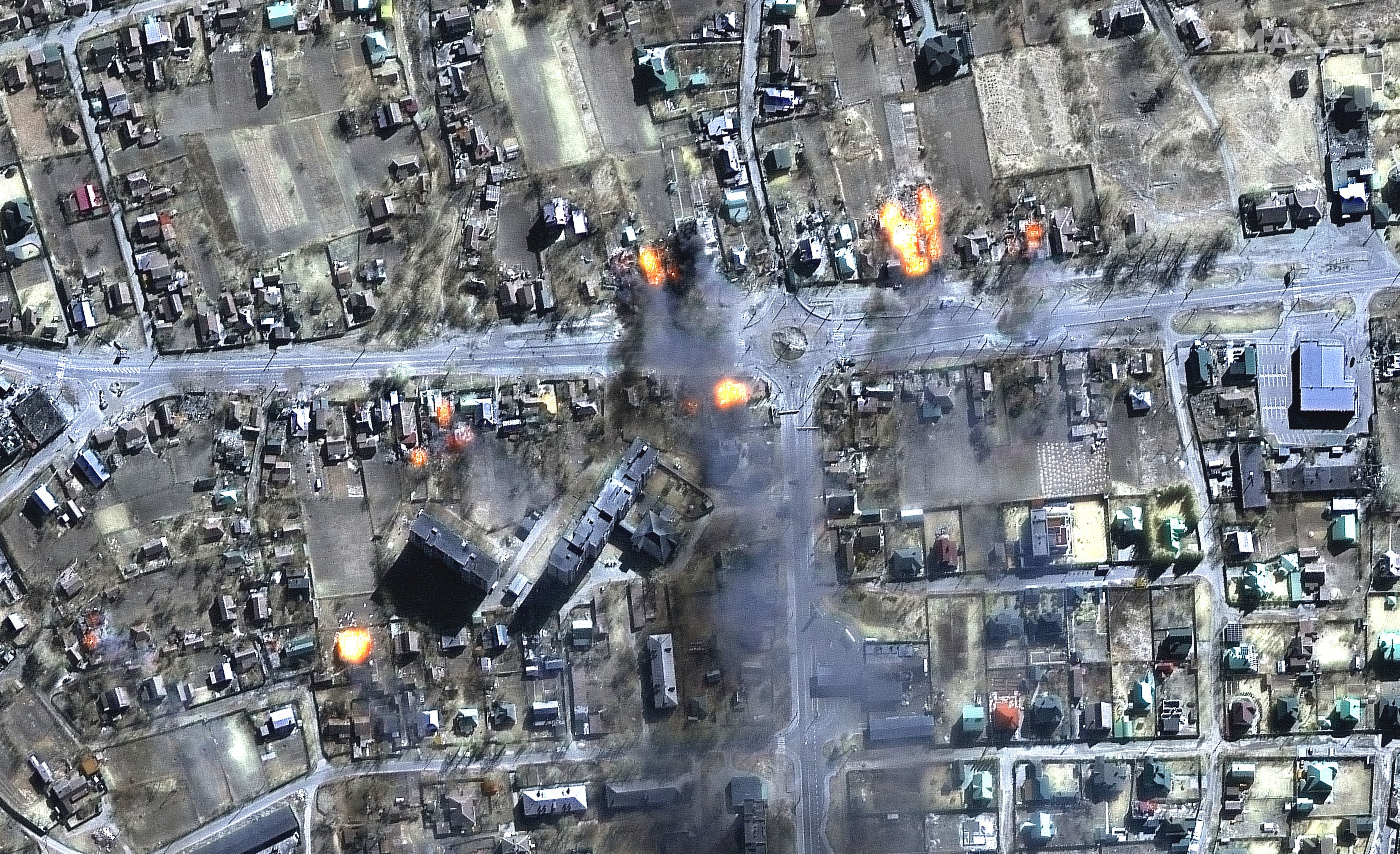 Handout satellite photo issued by Maxar Technologies dated 16/03/22 showing burning homes in residential area of Chernihiv, Ukraine.