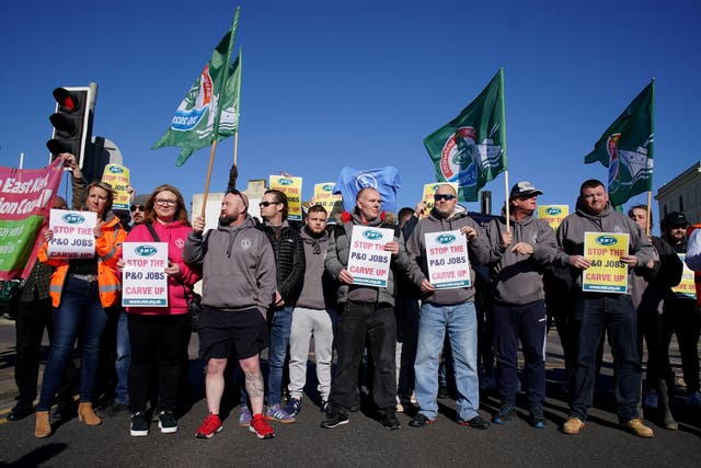 Former P&O staff and RMT union members block the road leading to the Port of Dover after P&O Ferries suspended sailings and handed 800 seafarers immediate severance notices (Gareth Fuller/PA)