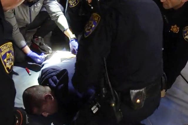 <p>In this image taken from a nearly 18-minute video taken by a California Highway Patrol sergeant, Edward Bronstein, 38, is being taken into custody by CHP officers on March 31, 2020</p>