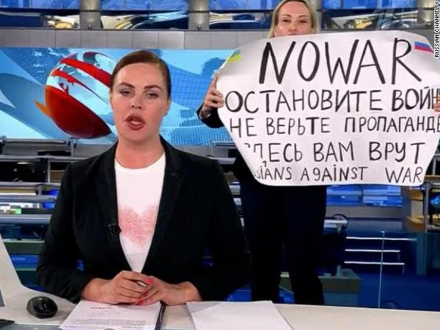 <p>Marina Ovsyannikova holds up ‘No War’ sign on Russia’s Channel One</p>