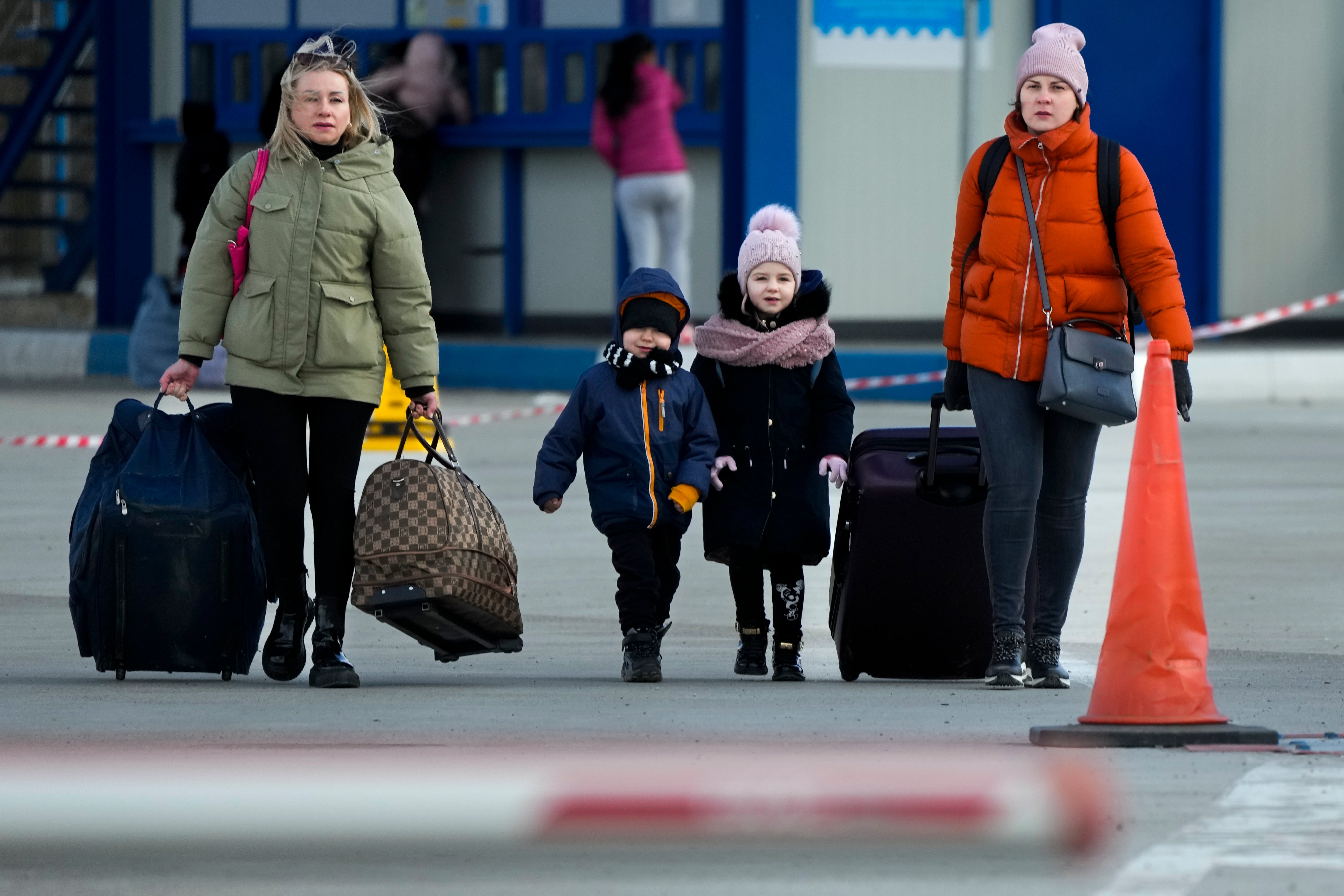 Refugees leaving Ukraine (Sergei Grits/AP)