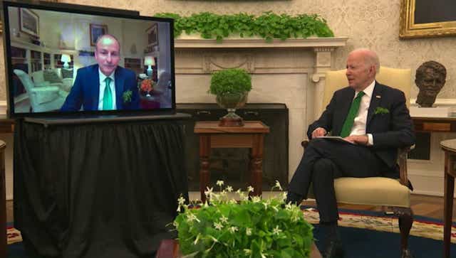 Handout screengrab from video issued by The White House of the bilateral meeting between Taoiseach Micheal Martin and US President Joe Biden via videolink (White House/PA)