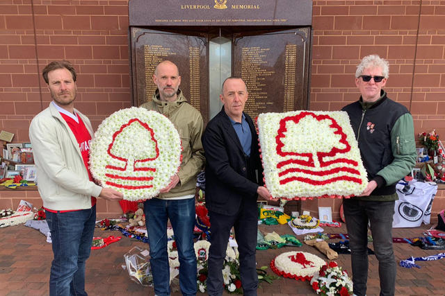 <p>Members of the NFFC Supporters’ Trust share their support at the Hillsborough memorial</p>
