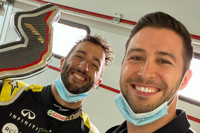 <p>Trainer Michael Italiano (right) plays a key role in Daniel Ricciardo’s F1 success</p>