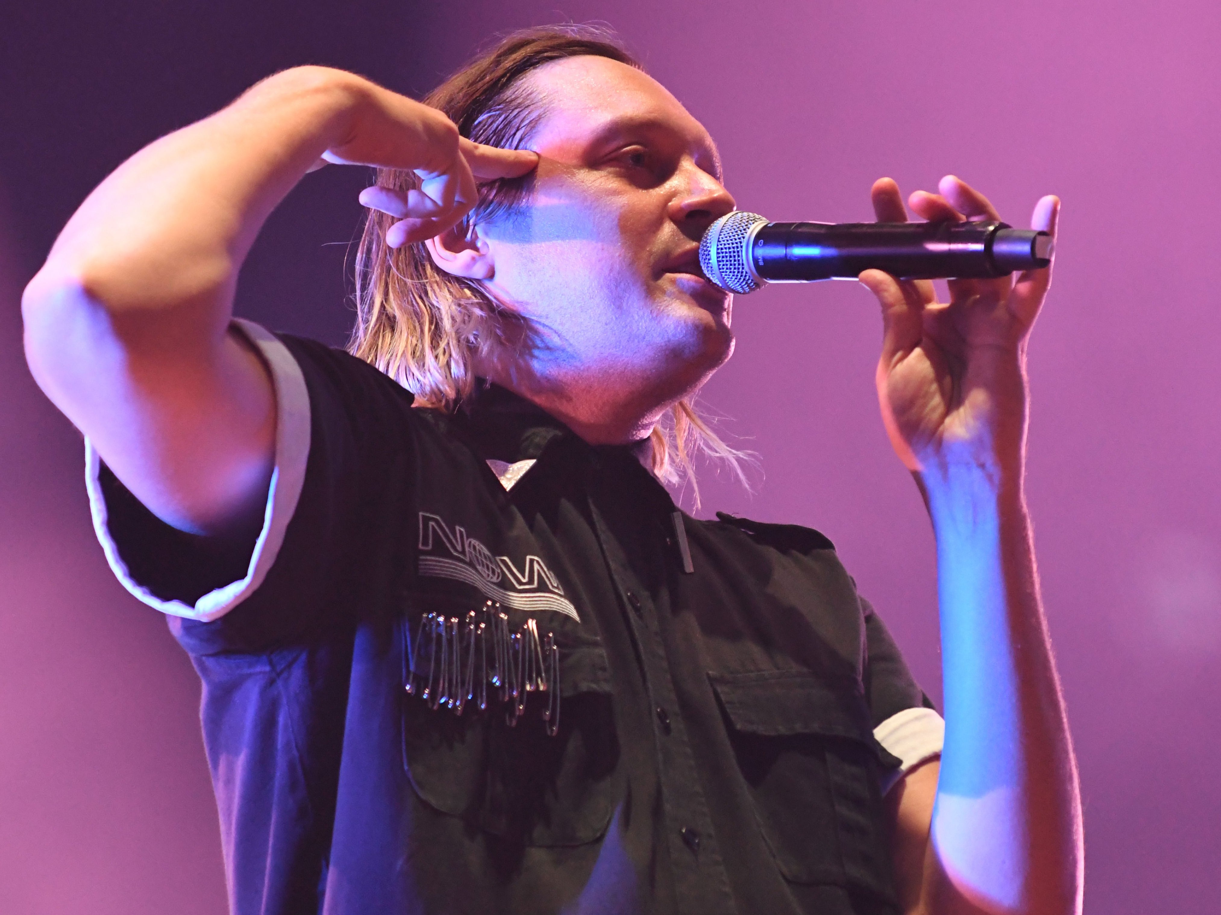 Win Butler of Arcade Fire performing in 2017