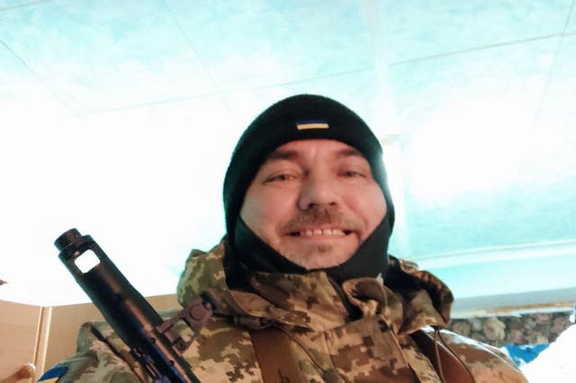 Andrii Zharikov’s teacher father has joined the territorial army to defend Kyiv from the Russian invaders (family handout/PA)