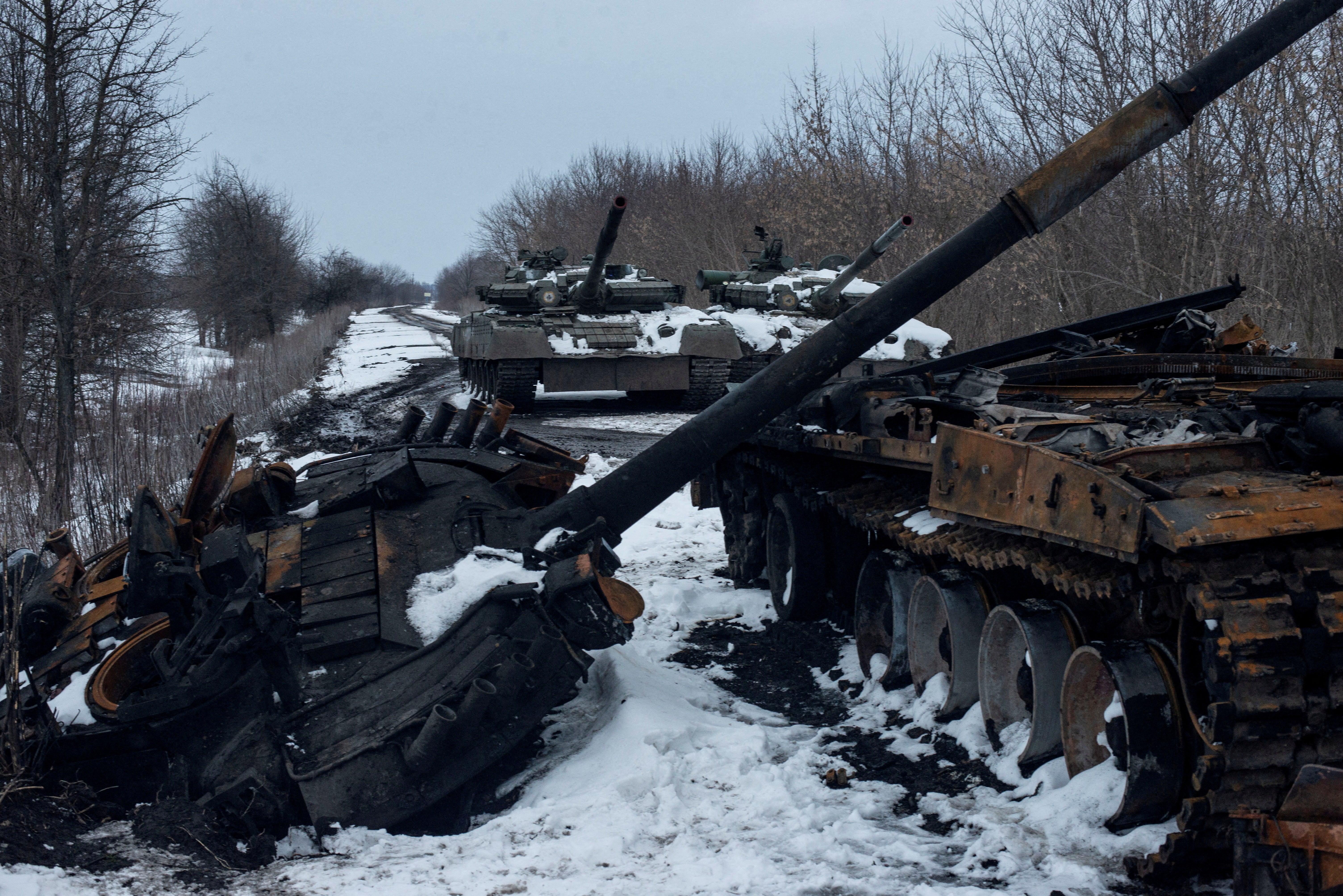 A charred Russian tank and captured tanks in the Sumy region of Ukraine.