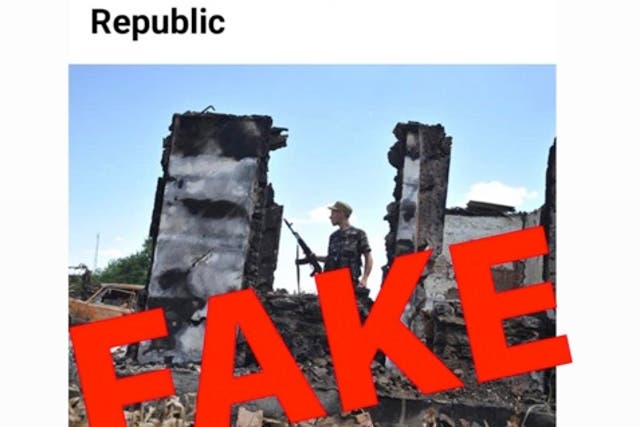 <p>The Tennessee National Guard shared images of the article from the Russian state-run paper with ‘FAKE’ emblazoned across it</p>