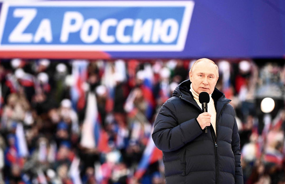 Putin hails Russian invasion and ‘reunification’ of Crimea at huge pro-war stadium rally