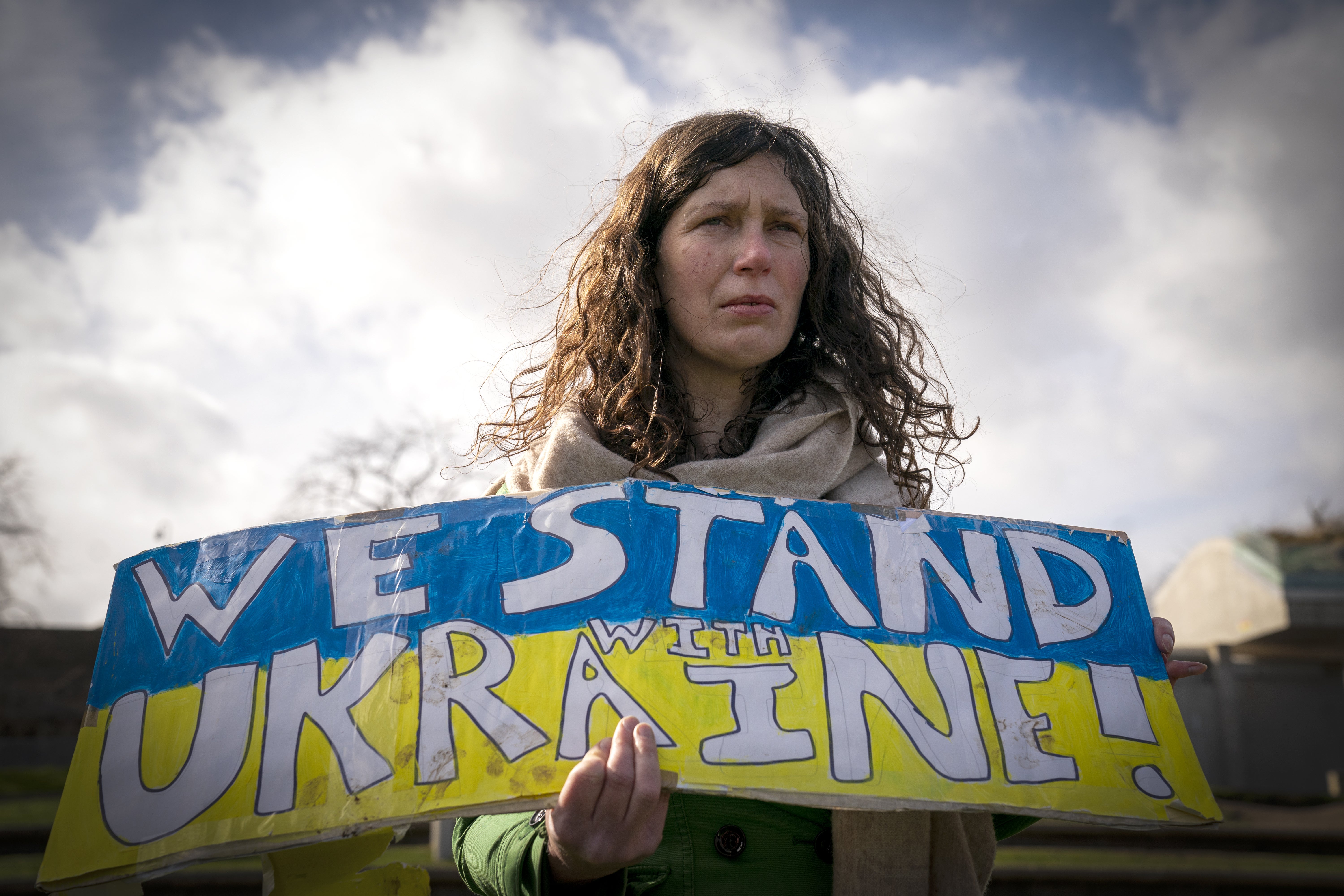 A protestor at the Scotland Stands with Ukraine peace rally, outside the Scottish Parliament in Edinburgh (Jane Barlow/PA)