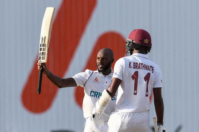 <p>Jermaine Blackwood celebrates his century against England </p>