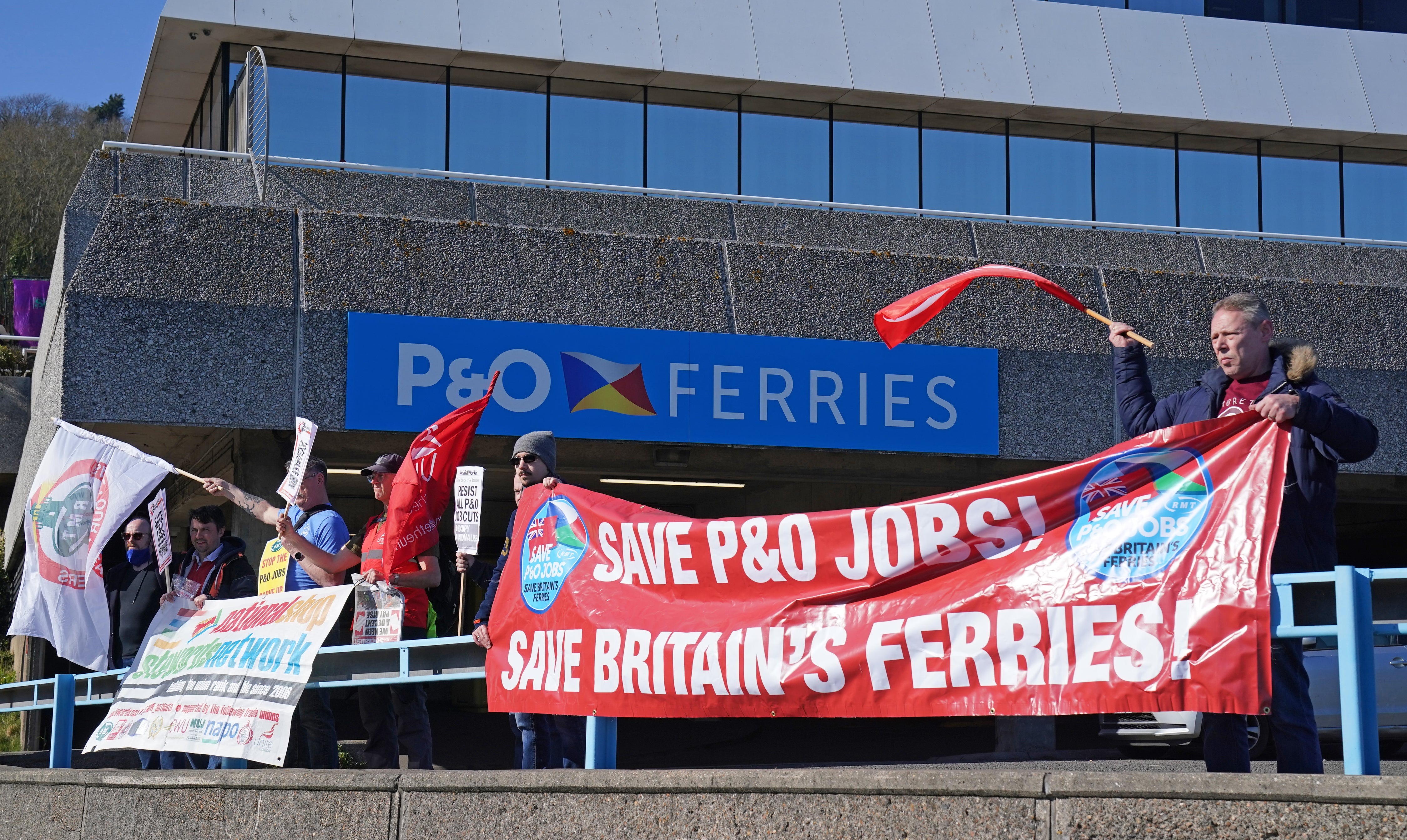 People protest outside the offices of P&O Ferries in Dover (Gareth Fuller/PA)