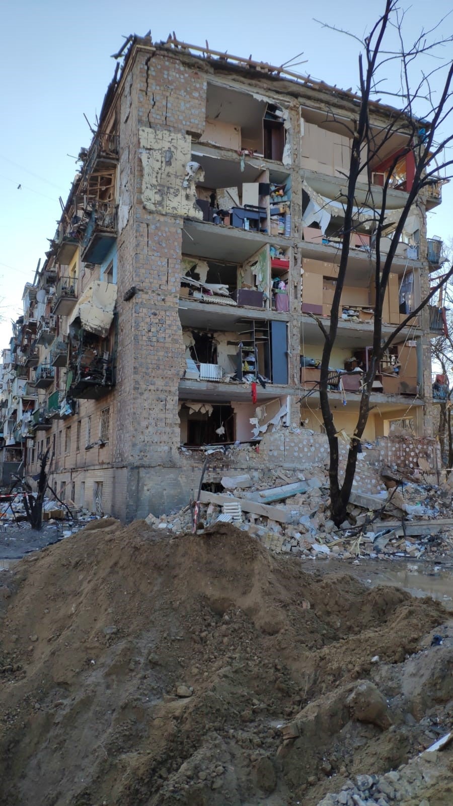 A damaged apartment block after airstrikes hit the Podil neighbourhood of Kyiv, 18 March 2022