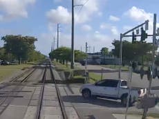 Video shows horrifying smash after truck turns into path of oncoming train in Florida