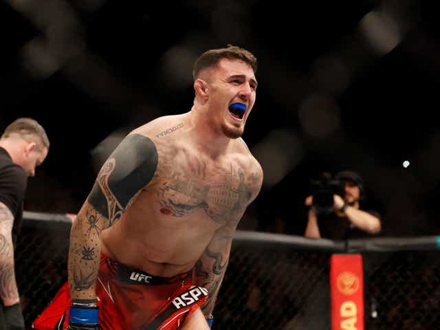<p>Tom Aspinall celebrates his submission of Alexander Volkov at UFC London </p>